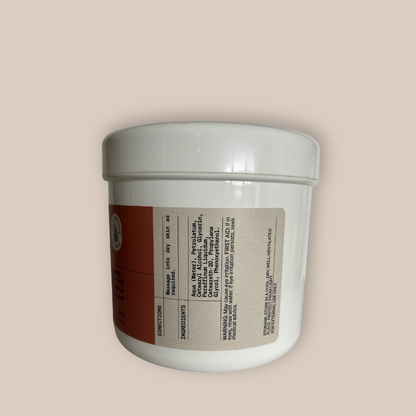 A back view of the Moisturising Aqueous Cream 500g Pot on beige background